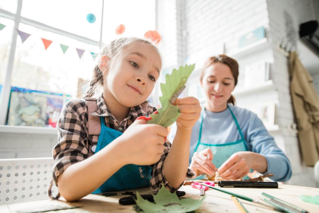 Girl and sessional worker playing