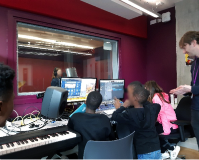 Young people in a recording studio 