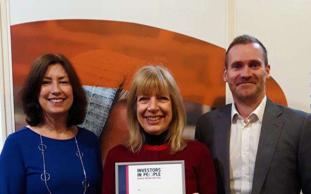 Kate Bromfield, Pam McConnell, CEO & Founder, and Ben Wallage celebrate IIP Gold