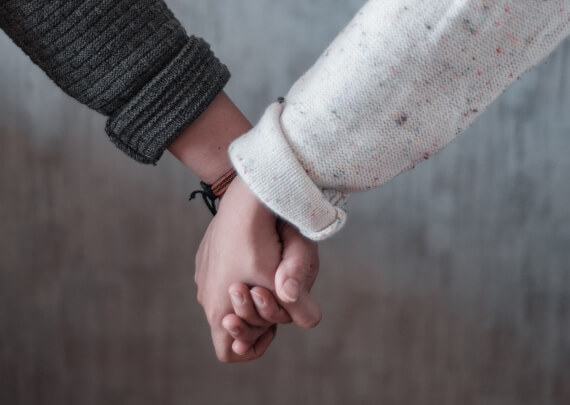 foster children holding hands