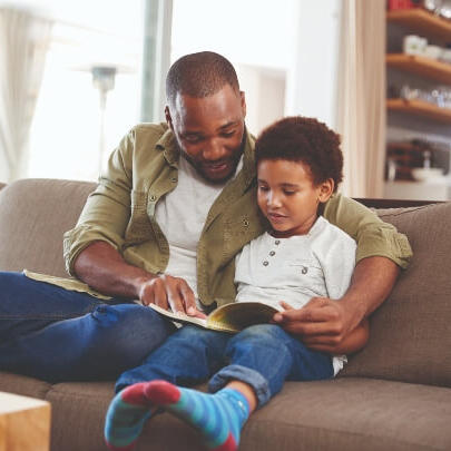 Foster parent reading to child