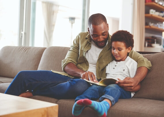 Foster parent reading to child