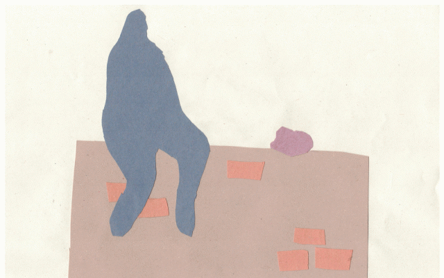 Children's collage of person on wall