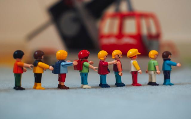 line of figurines representing 'can you work and foster'