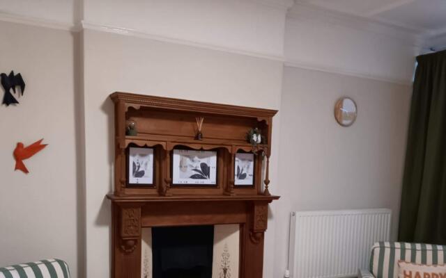 Home with a fire place and cozy sofas