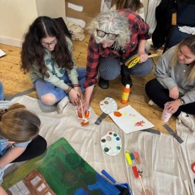 Liv with children creating puppets for antibullying week