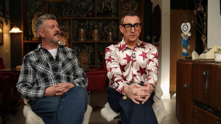 Barry and Iain, Foster Carers sat inliving room